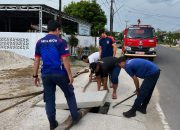 SPPG Padang Mulia dan Damkar Kompak Jaga Kebersihan Lingkungan